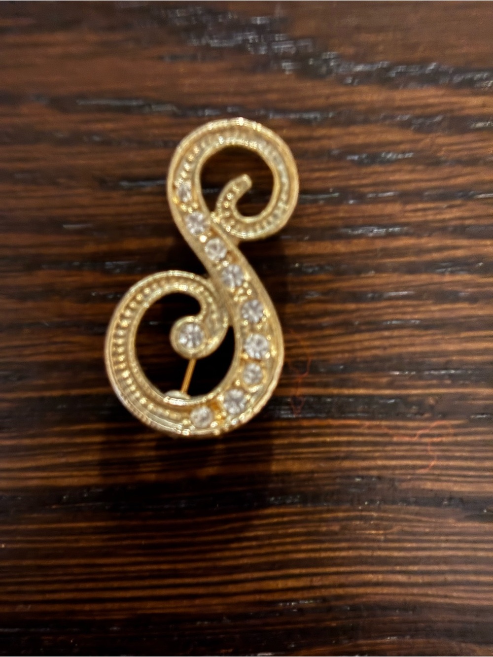 Gold-Tone Crystal Swirl Brooch - Elegant Women's Jewelry